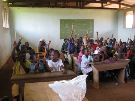 Children holding Pencils